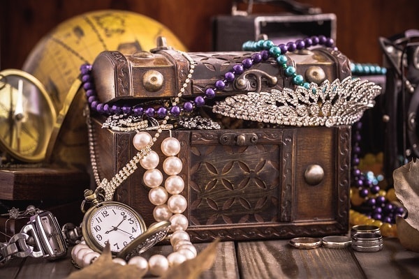 a treasure chest filled with antique items