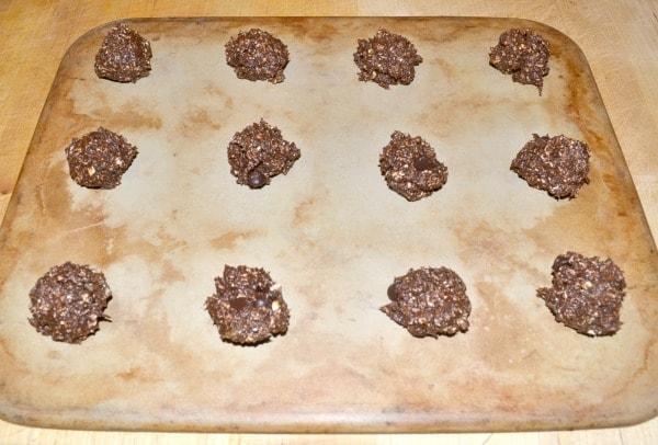Form the chocolate protein cookie dough into balls and space 2 inches apart on a baking sheet