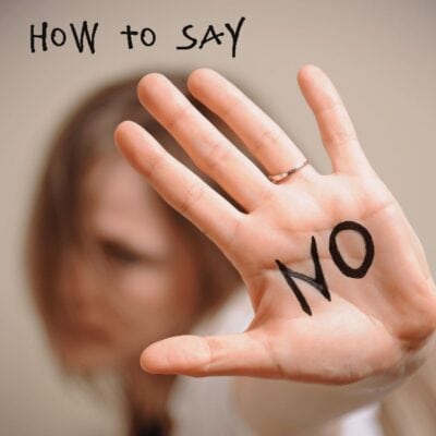A person holds up their hand with "NO" written on the palm; the text "how to say no" appears at the top of the image.