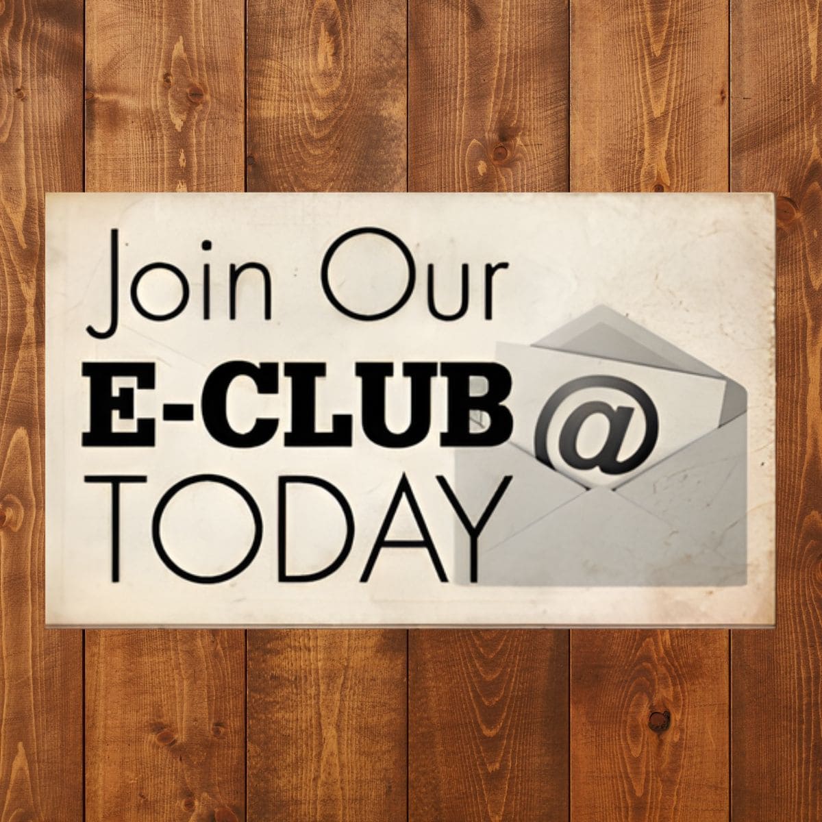 A sign on a wood background reads "Join Our E-Club Today" with an envelope and email symbol in the background.