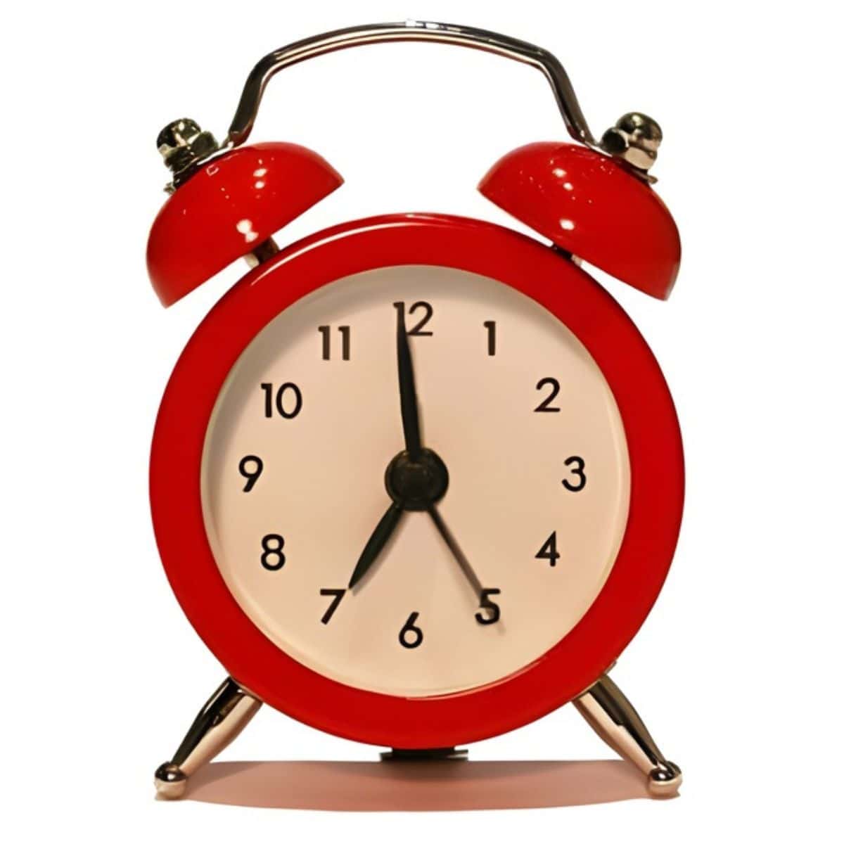 A red analog alarm clock showing the time as 7:00, with two bells on top and metal legs, against a white background—perfect for timing your next 10 minute workout.