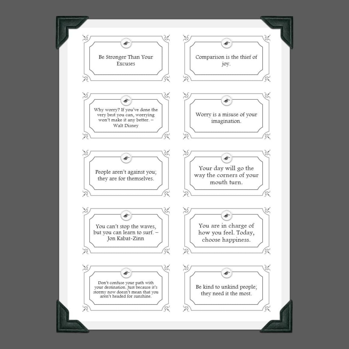 A sheet displaying twelve motivational quotes in a 3x4 grid, each bordered box offering inspiring pep talks, with black corner protectors on a crisp white background.