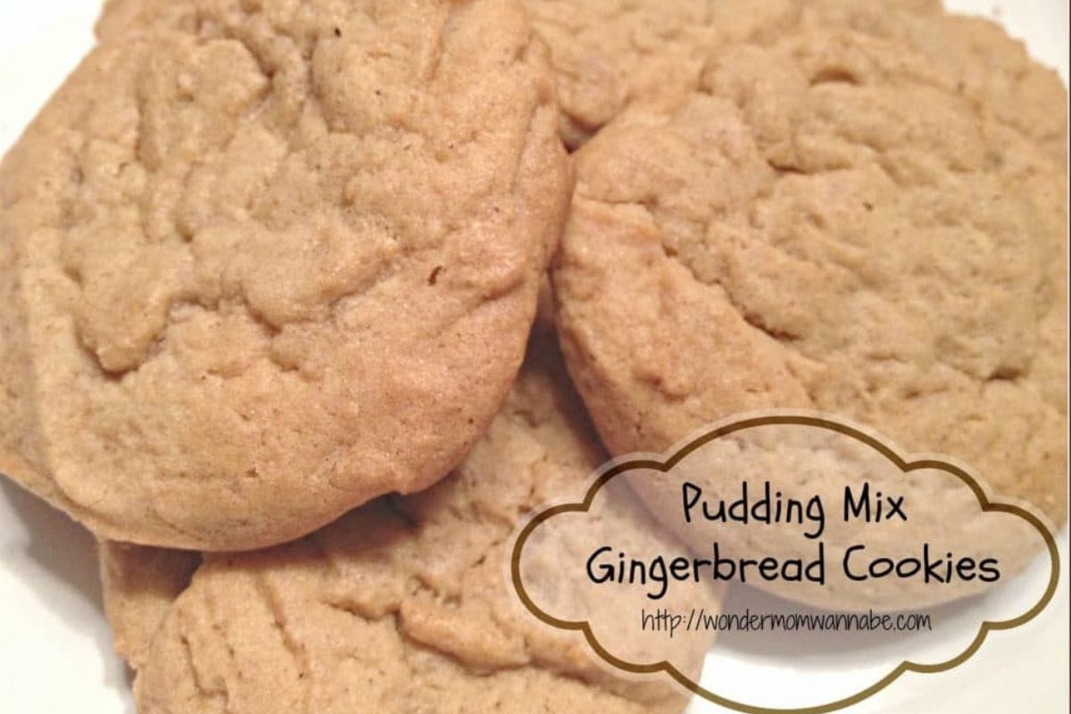 Close-up of gingerbread cookies on a white plate with text overlay that reads "Pudding Mix Gingerbread Cookies.