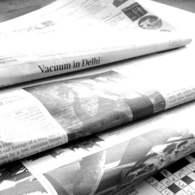 Black and white picture of newspapers