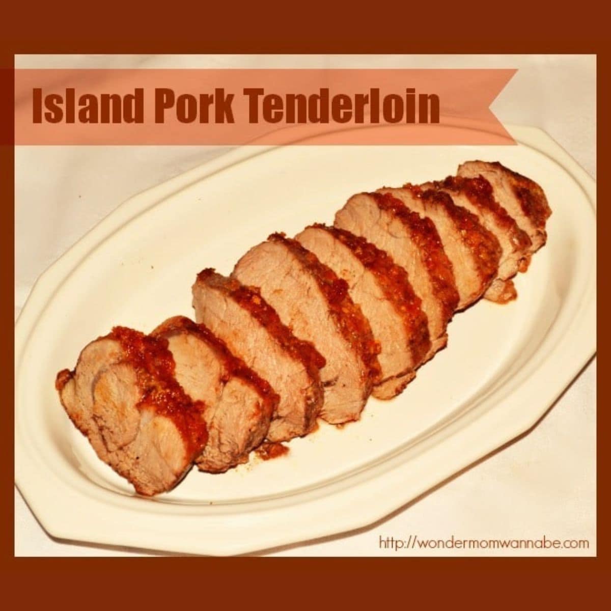 Sliced island pork tenderloin with a reddish sauce arranged on a white oval plate, presented under the heading "Island Pork Tenderloin.