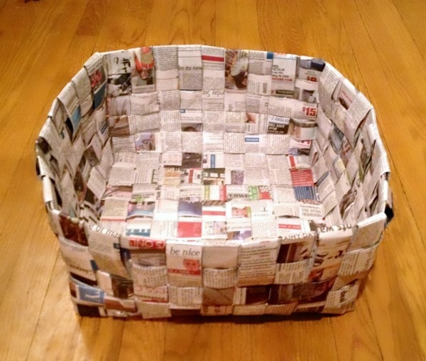 Newspaper Basket on a wood background