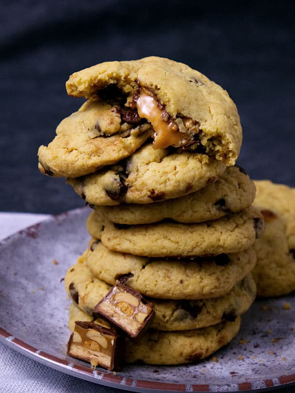 a stack of Snickers Cookies on a plate