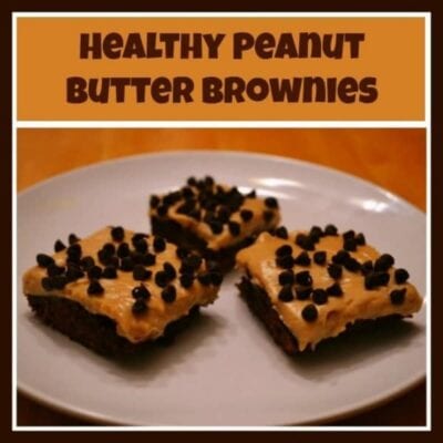 Three healthy peanut butter brownies topped with chocolate chips are arranged on a white plate, with the text "Healthy Peanut Butter Brownies" above the image.
