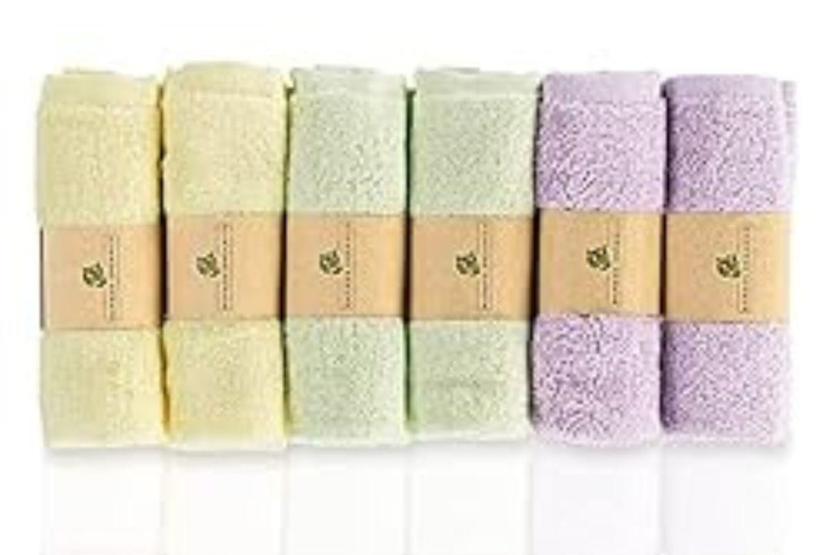 yellow, green and purple rolled up towels.