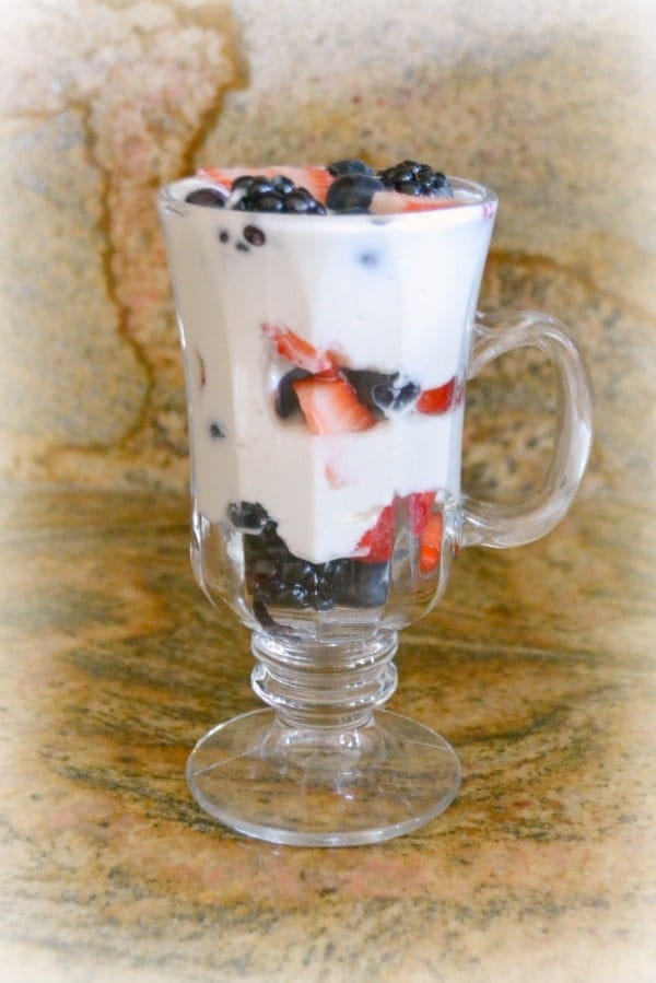 Berry Yogurt Parfait in a glass as a Mother's Day breakfast idea