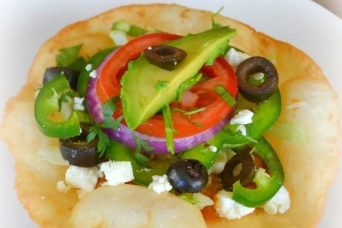 Chicken Tostadas on a white plate.