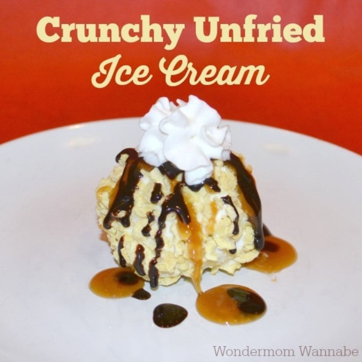A scoop of crunchy unfried ice cream topped with whipped cream, chocolate syrup, and caramel sauce creates a delightful dessert on a white plate.