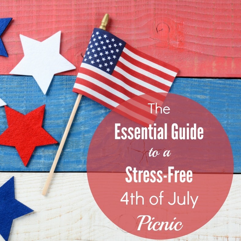 red, white and blue stars next to a mini American flag on a wood table painted red, white, and blue with title text reading The Essential Guide to a Stress Free 4th of July Picnic