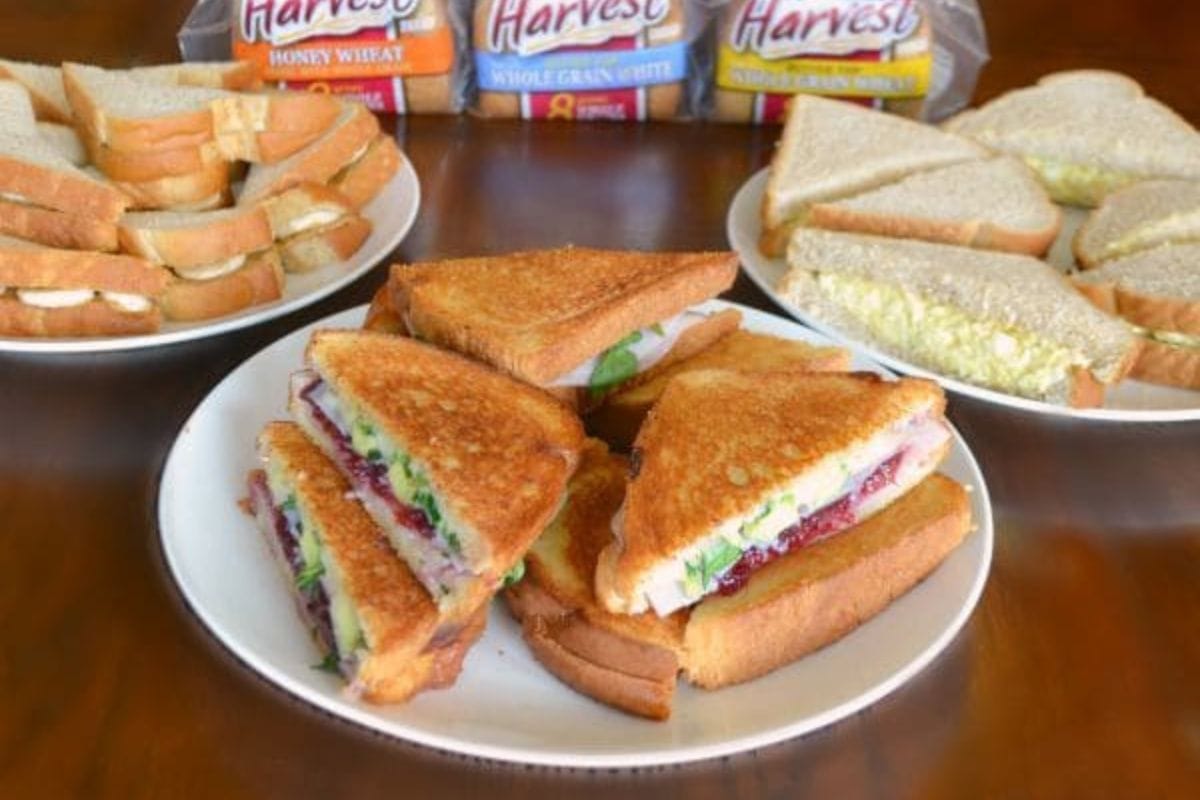 Three plates of sandwich varieties for the whole family are on the table.