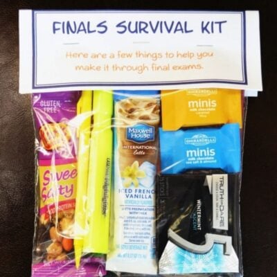 A clear finals survival kit bag contains snacks, instant coffee, highlighters, chocolate, and gum—everything students need to power through final exams.