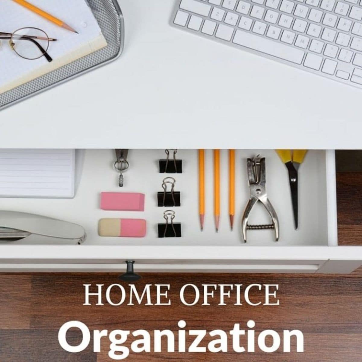 A tidy home office drawer with pencils, erasers, binder clips, a hole punch, and scissors, next to a keyboard and notepad on a desk—perfect inspiration for your home office organization ideas. Text: "Home Office Organization.