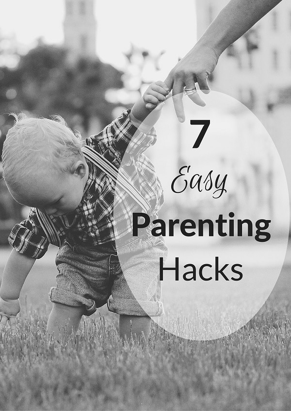 a little boy bending down to touch the grass while holding his mom's hand with title text reading 7 Easy Parenting Hacks