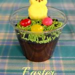 Easter Pudding Cup with green sprinkles, jelly beans, and a yellow peep