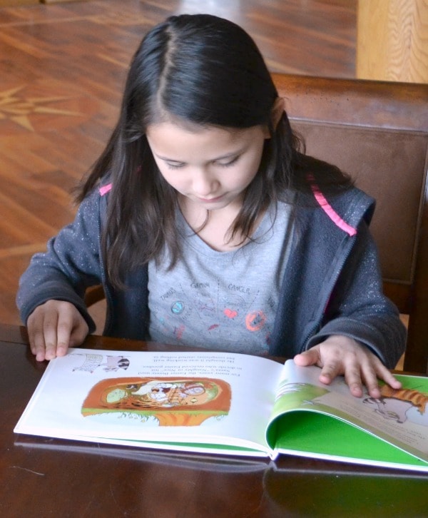 a girl Reading Easter Eggsters