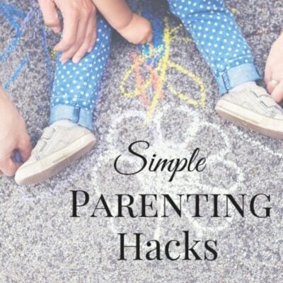 Two adults and a child sit on pavement with chalk drawings. Text overlay reads, "Simple Parenting Hacks for everyday life.