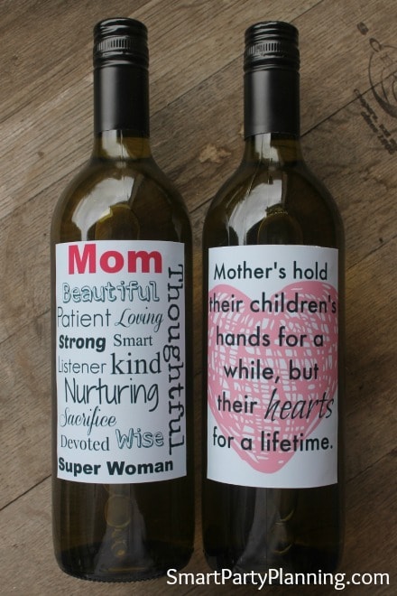 Printable Mothers Day Wine-Labels on wine bottles on a wood background