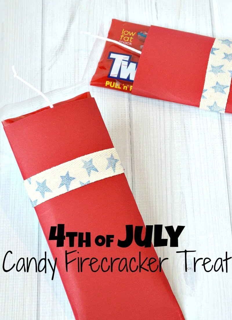 twizzlers wrapped in a red paper on a white wood background with title text reading 4th of July Candy Firecracker Treat