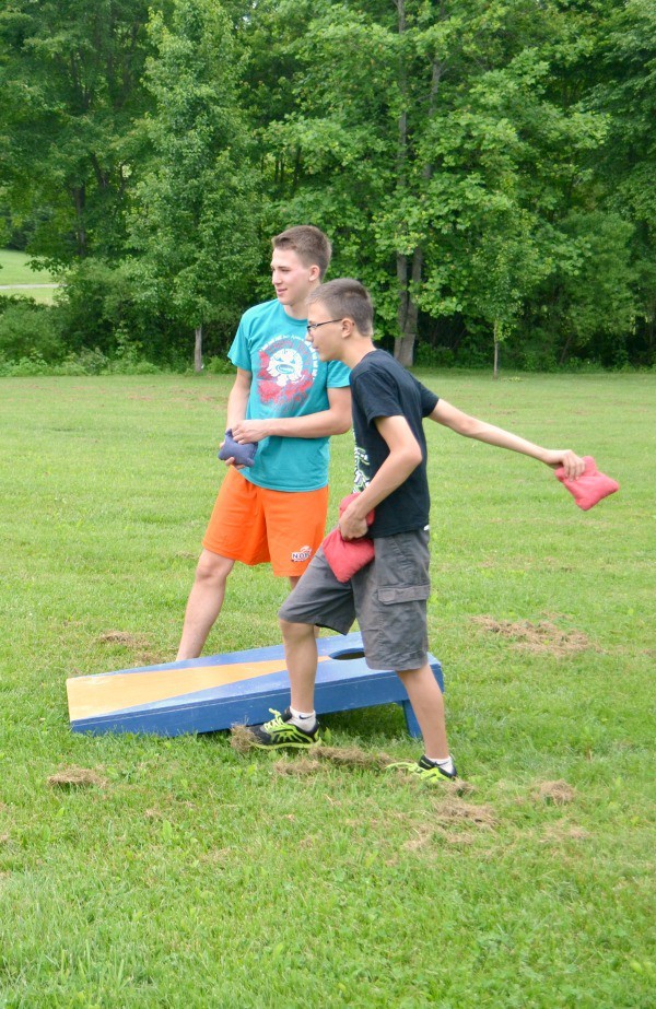 two brothers playing an outdoor game