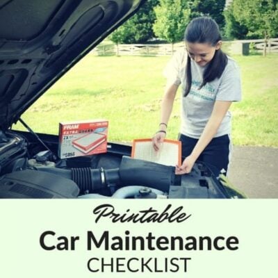 A person stands by an open car hood, holding an air filter, next to a box labeled "FRAM," with text below reading "Free Printable Car Maintenance Checklist.
