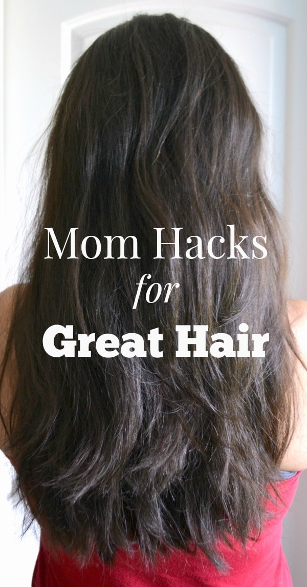 the back of a lady showing her beautiful hair with title text reading Mom Hacks for Great Hair