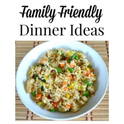 Bowl of fried rice with mixed vegetables on a bamboo mat, perfect for family friendly dinner ideas, below the text "Family Friendly Dinner Ideas.