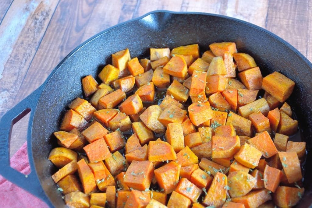 cast-iron-sweet-potatoes on a brown table