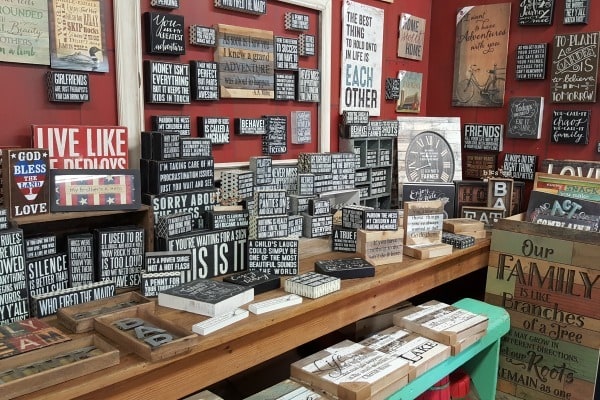 a store with wooden signs in it
