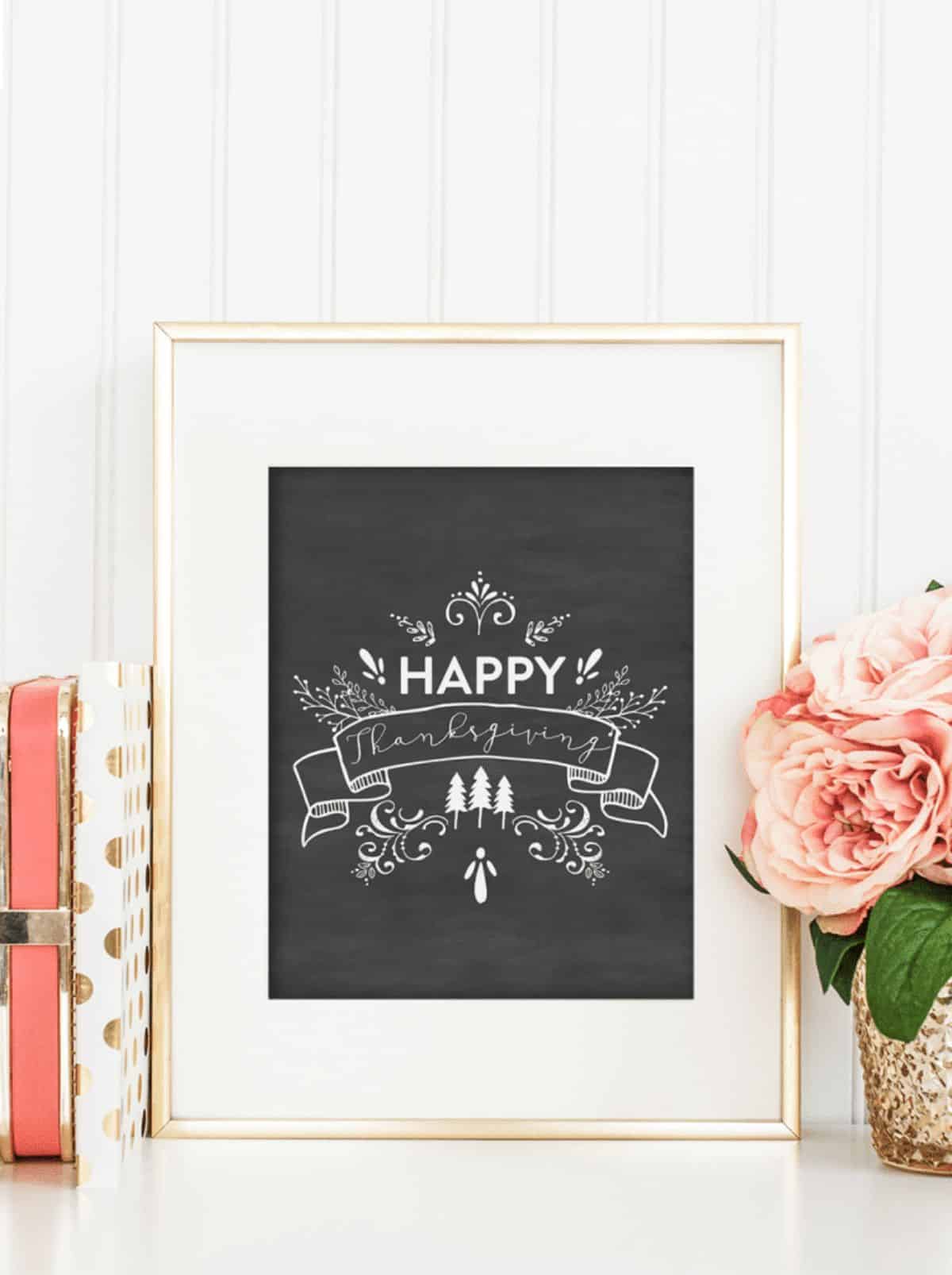 An easy and festive framed chalkboard print with the words "Happy Thanksgiving".