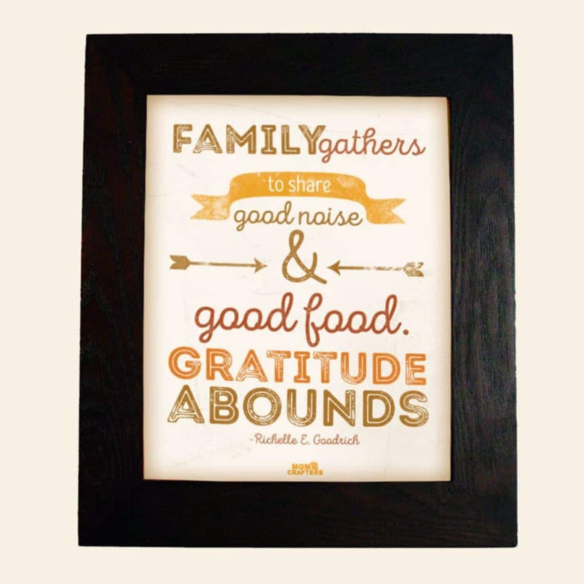 An easy Thanksgiving decor idea - a framed print that embodies the essence of family, good food, and gratitude.