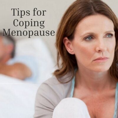 A woman sits on a bed looking concerned, while a man is blurred in the background; text reads "Tips for Coping with Menopause.
