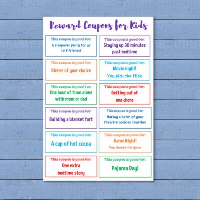 A sheet of colorful printable reward coupons for kids, offering fun activities like a sleepover, extra bedtime story, pajama day, hot cocoa, game night, and movie night.