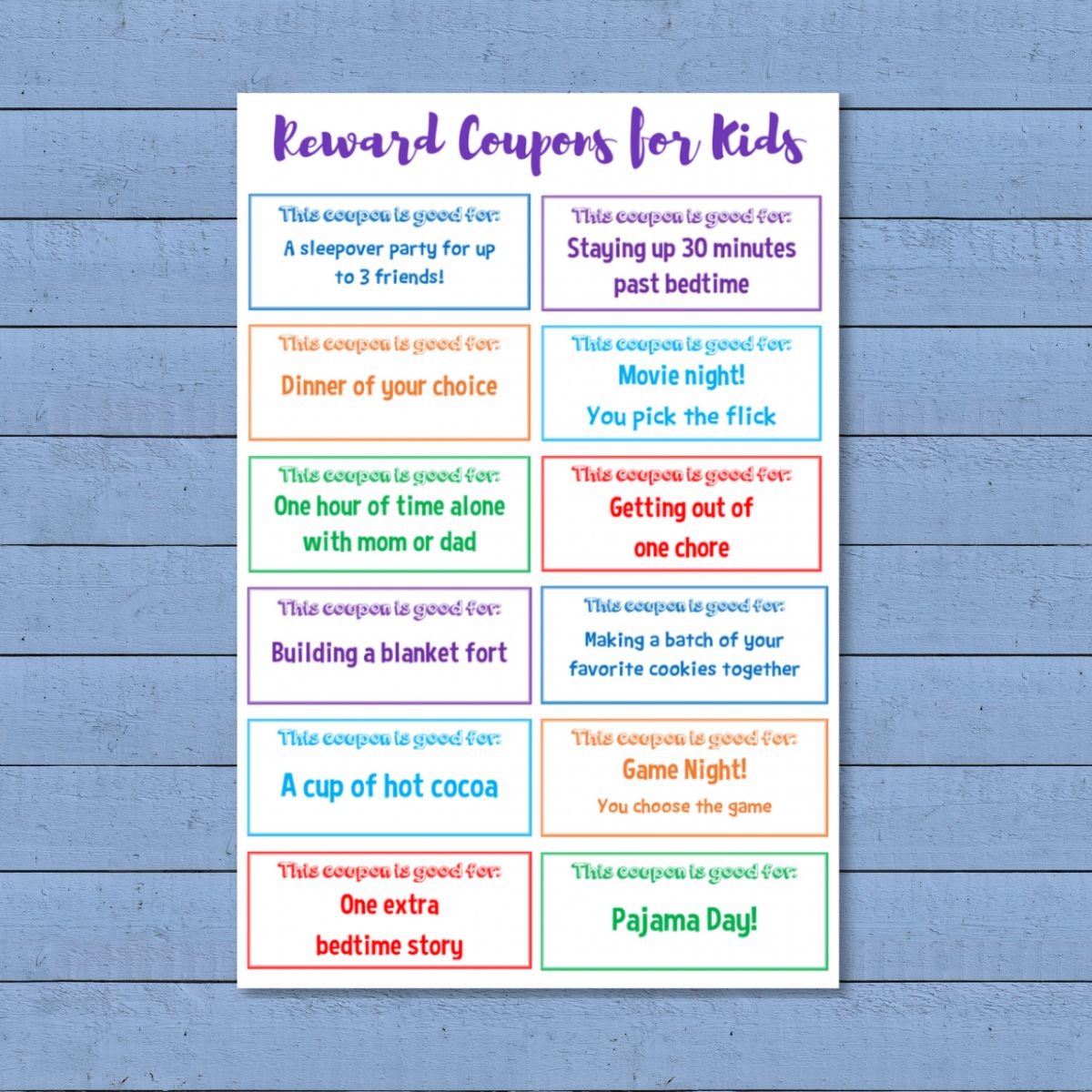 A sheet of colorful printable reward coupons for kids, offering fun activities like a sleepover, extra bedtime story, pajama day, hot cocoa, game night, and movie night.
