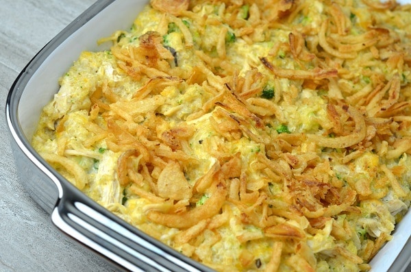 Chicken Broccoli Quinoa Casserole topped with french fried onions in a baking dish