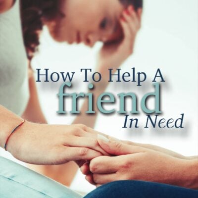 Two people sit close together, one comforting the other by holding their hand. Text reads: "How to help a friend in need"—showing the warmth and support we can offer those who are struggling.