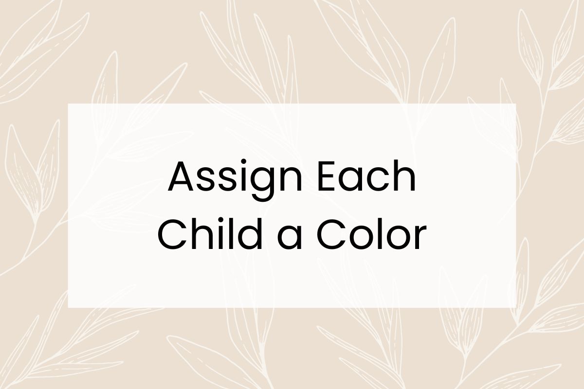 Text on a beige background with white leaf outlines reads, "Assign Each Child a Color".