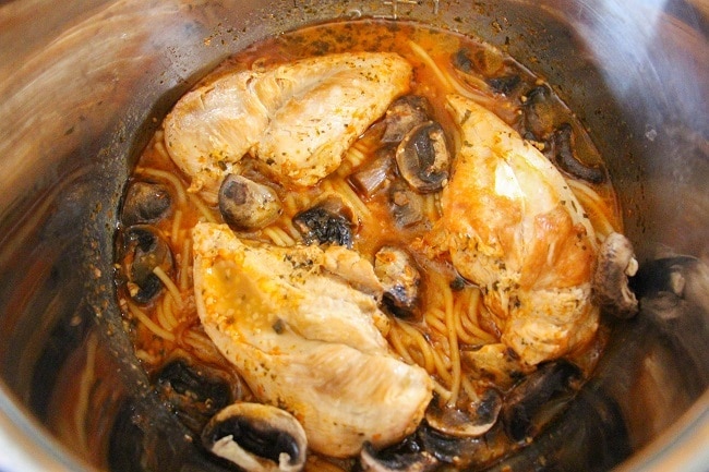 chicken, mushrooms, noodles, and sauce in an instant pot