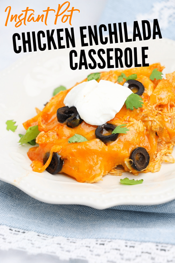 chicken enchilada on a white plate on a blue cloth with title text reading Instant Pot Chicken Enchilada Casserole