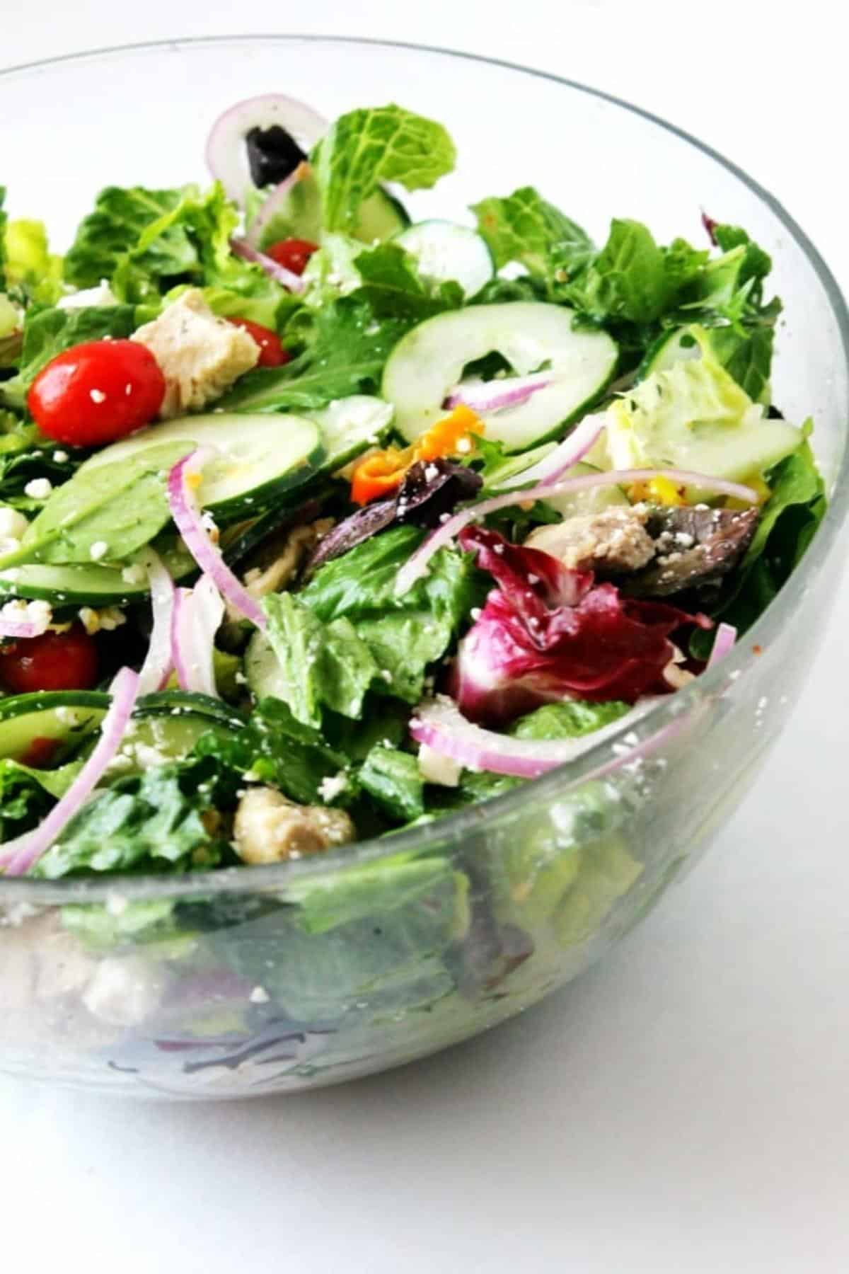 Greek salad in a glass bowl.