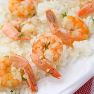 An appetizing plate of Instant Pot shrimp scampi with rice.