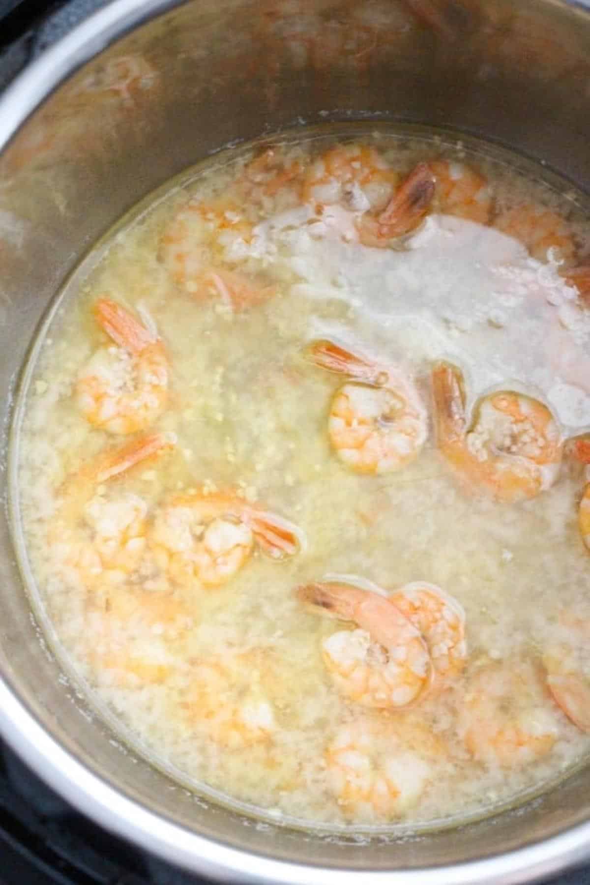 shrimp, sauce and garlic in an instant pot.