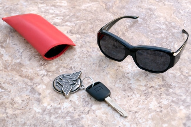key, wonder woman keychain, sunglasses, glasscase