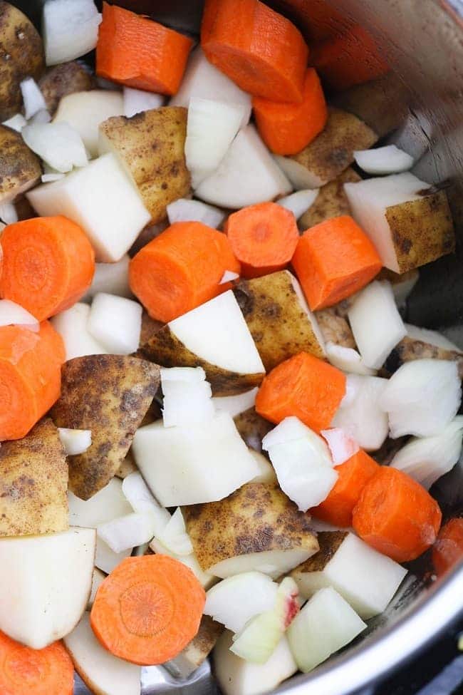 large chunks of carrots, potatoes and onion in an instant pot