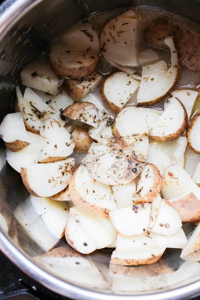 sliced potatoes, water and seasonings in an instant pot