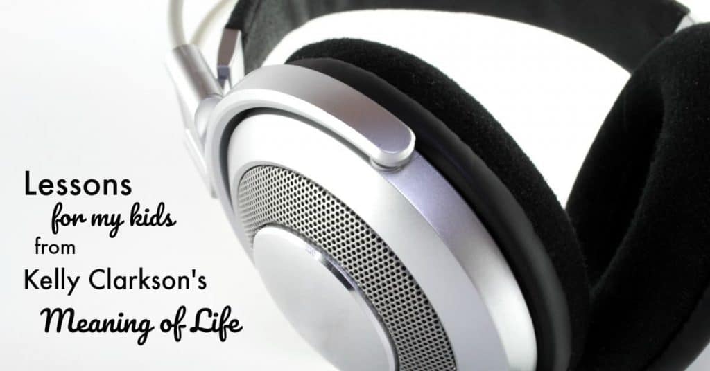 a close up of headphones on a white background with title text reading Lessons for my kids from Kelly Clarkson's Meaning of Life