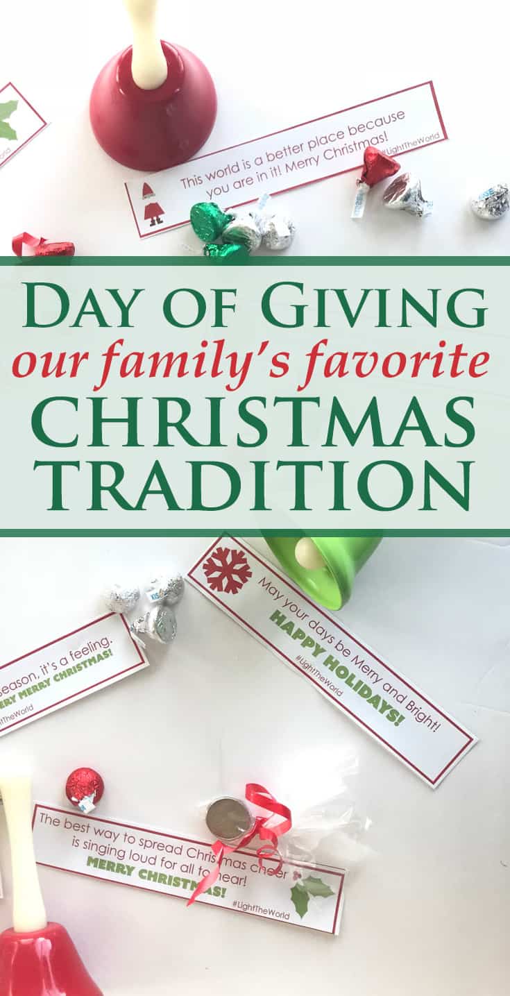 red and green bells, hersheys kisses and strips of paper with various encouraging Christmas phrases on them on a white background with title text reading Day of Giving our family's favorite Christmas Tradition